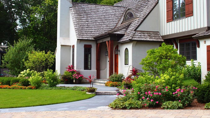 front of house with paver walkway leading to door